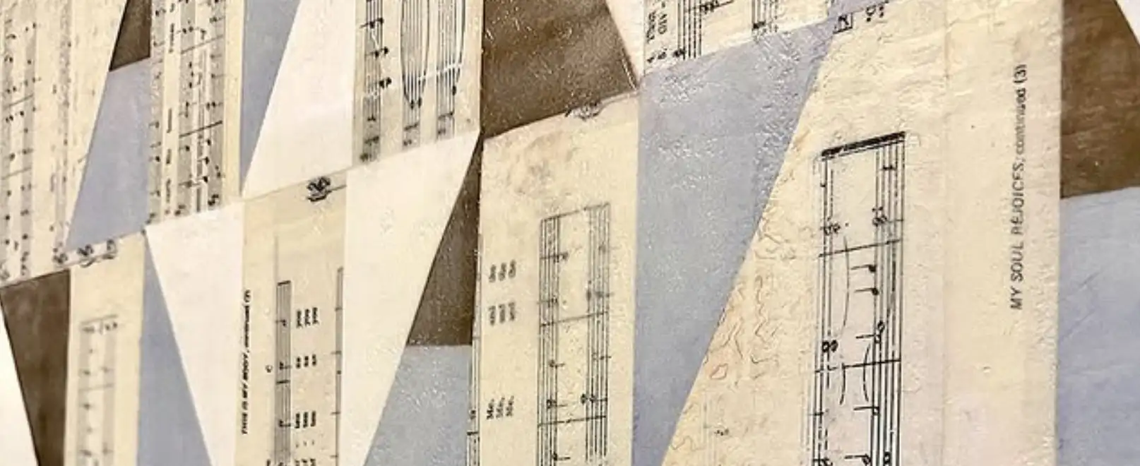 Collage of sheet music and slate blue and brown triangular shapes.