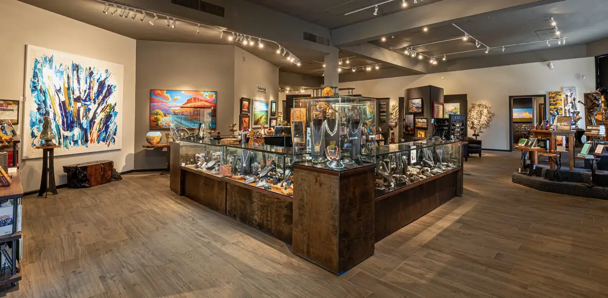 Anticus gallery interior showing original 2 and 3D art and books.